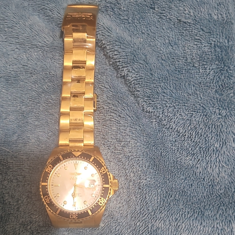 Elegant Gold and Silver Watch with Black Accents